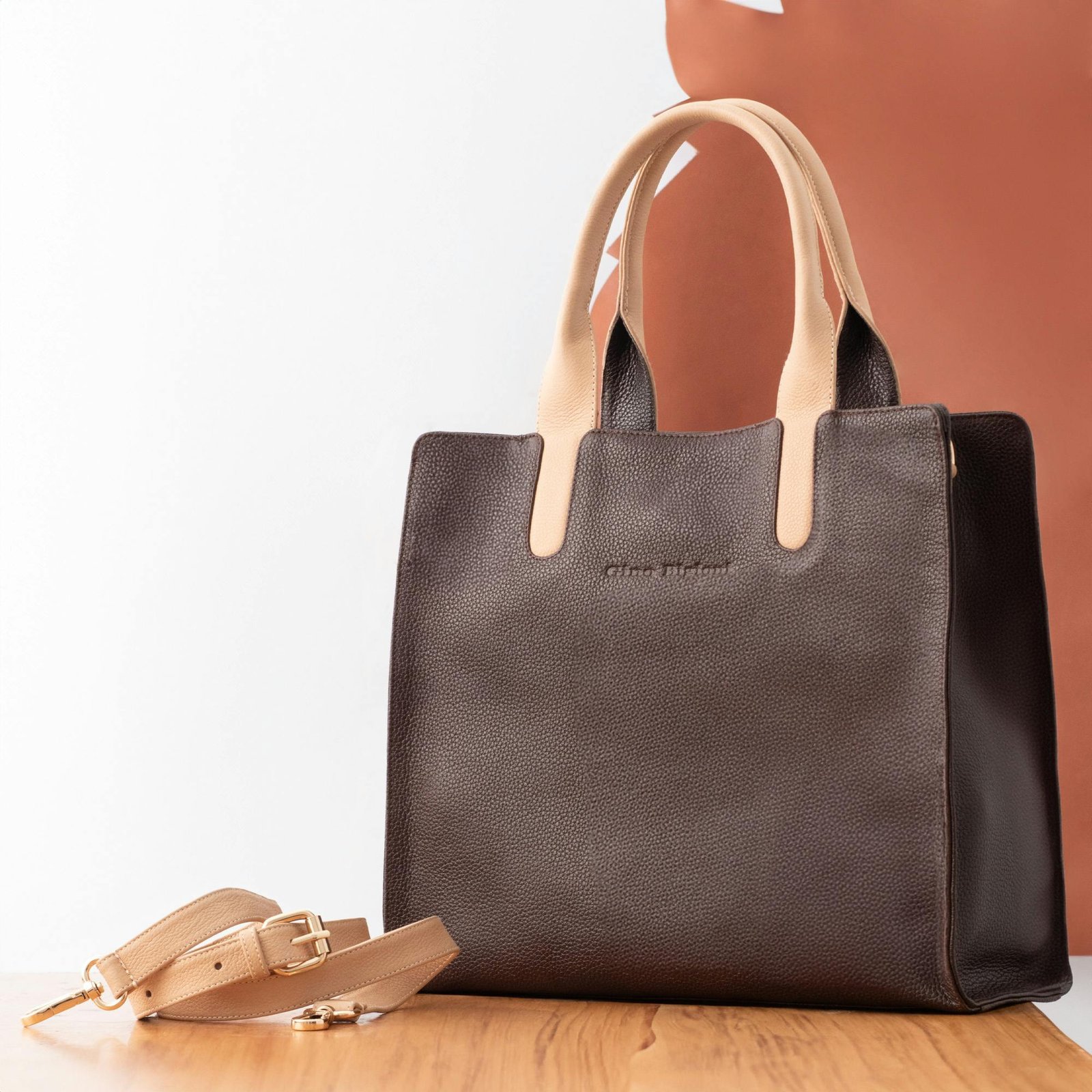 Sophisticated close-up of a brown leather handbag with a strap, ideal for fashion editorials.